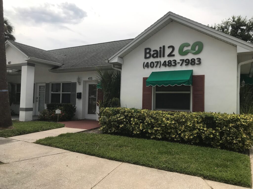 Bail 2 GO Kissimmee bail bonds office, open 24 hours, with the (407) 483-7983 number on the building